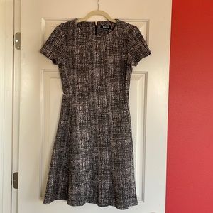 Like new black and pastel pink fit and flare dress